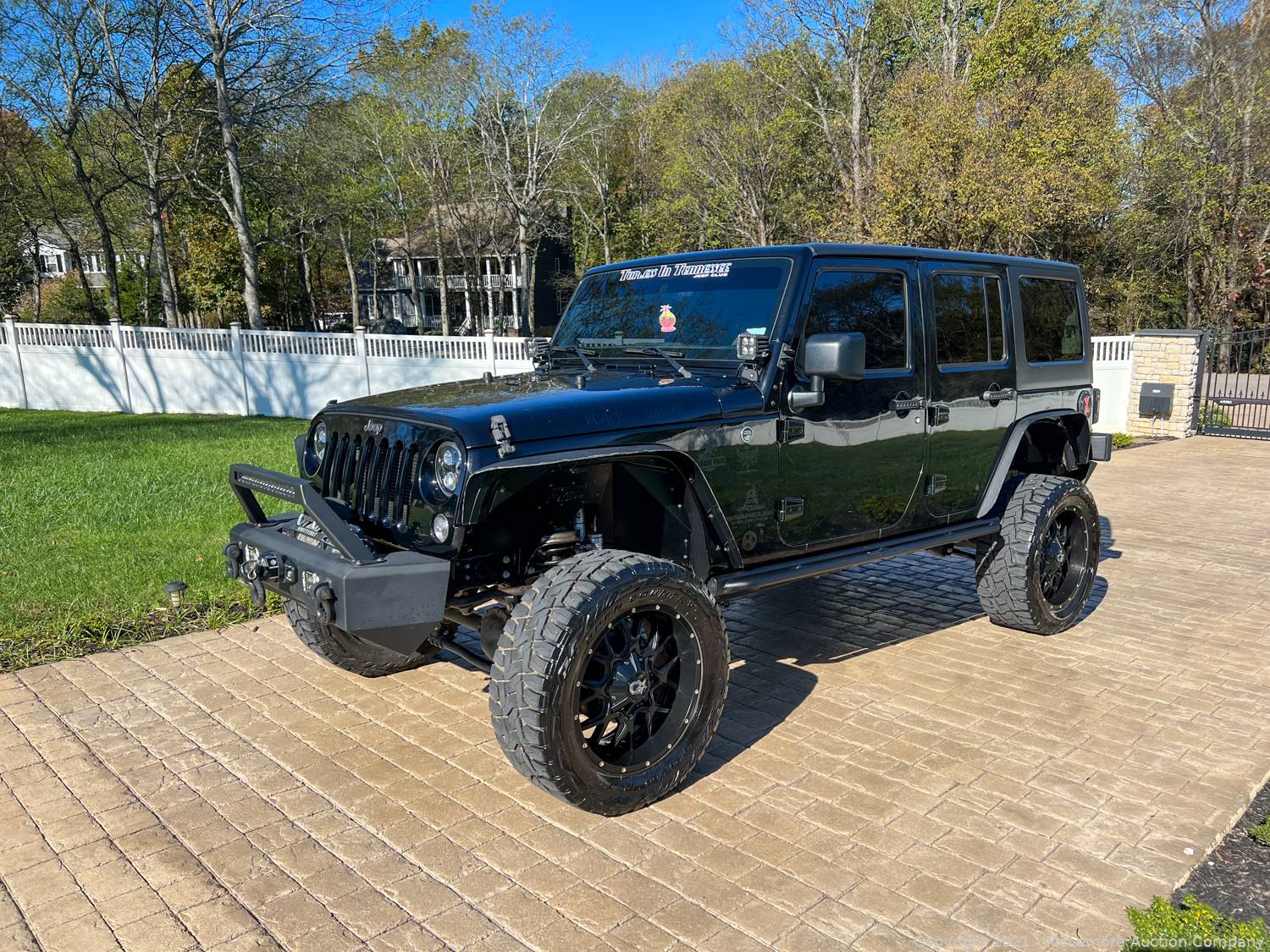 McLemore Auction Company - Auction: 2017 Jeep Wrangler with Custom Wheels,  Lift Kit and Aftermarket Accessories ITEM: 2017 Jeep Wrangler with Custom  Wheels, Lift and Accessories VIN 1C4BJWDG9HL554695