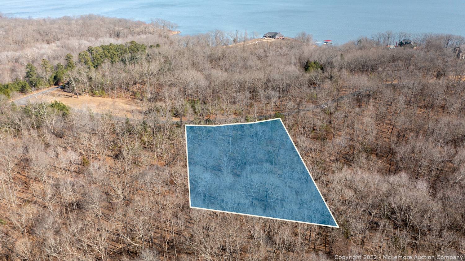 McLemore Auction Company Auction Four Building Lots in Western