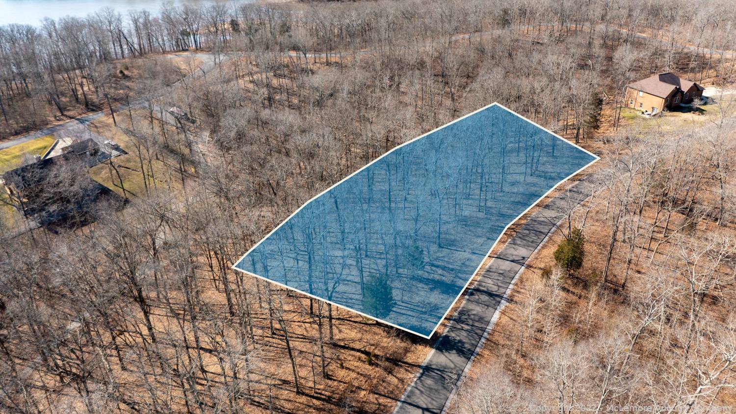 McLemore Auction Company Auction Four Building Lots in Western