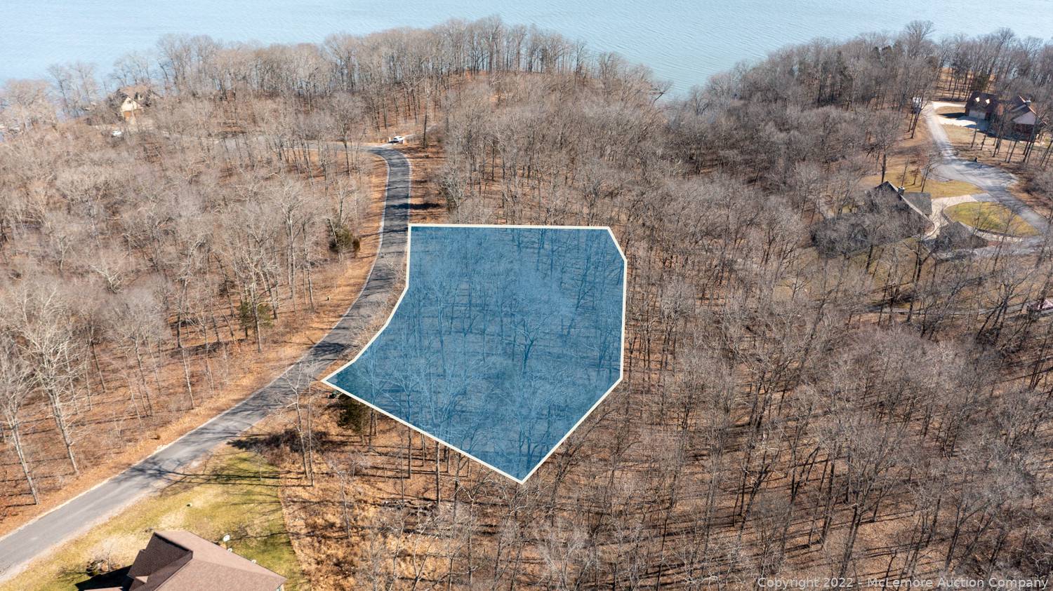 McLemore Auction Company Auction Four Building Lots in Western