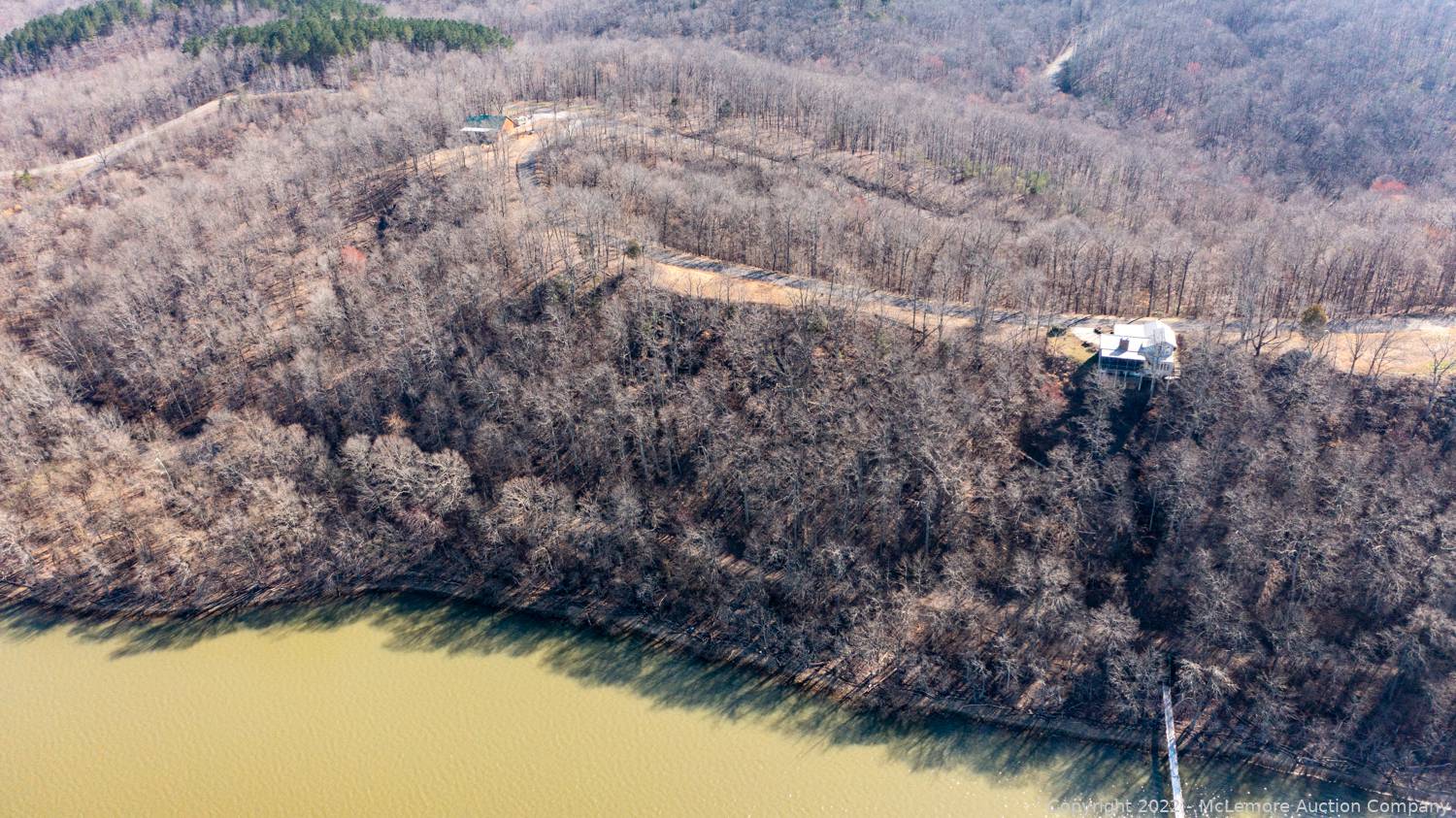 McLemore Auction Company Auction Three Building Lots in Sunset