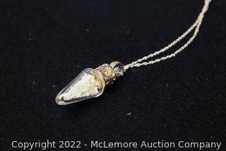 Pendant on Necklace Filled with Diamonds