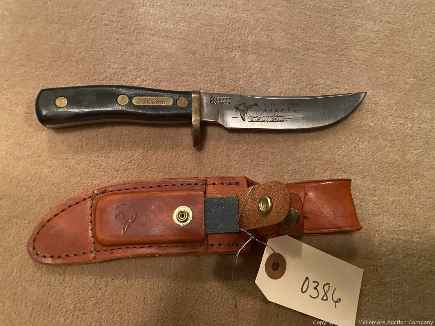 McLemore Auction Company Auction Treadlok Gun Safe, Firearm Cleaning