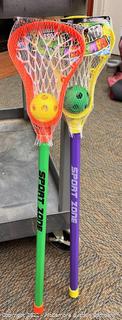 Ja-Ru GAME ON! Toss Lacrosse - New. Buying two sticks and 2 balls. Colors will be random