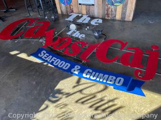 (2) Lighted Metal Signs for the Former "Lost Cajun" Restaurant 