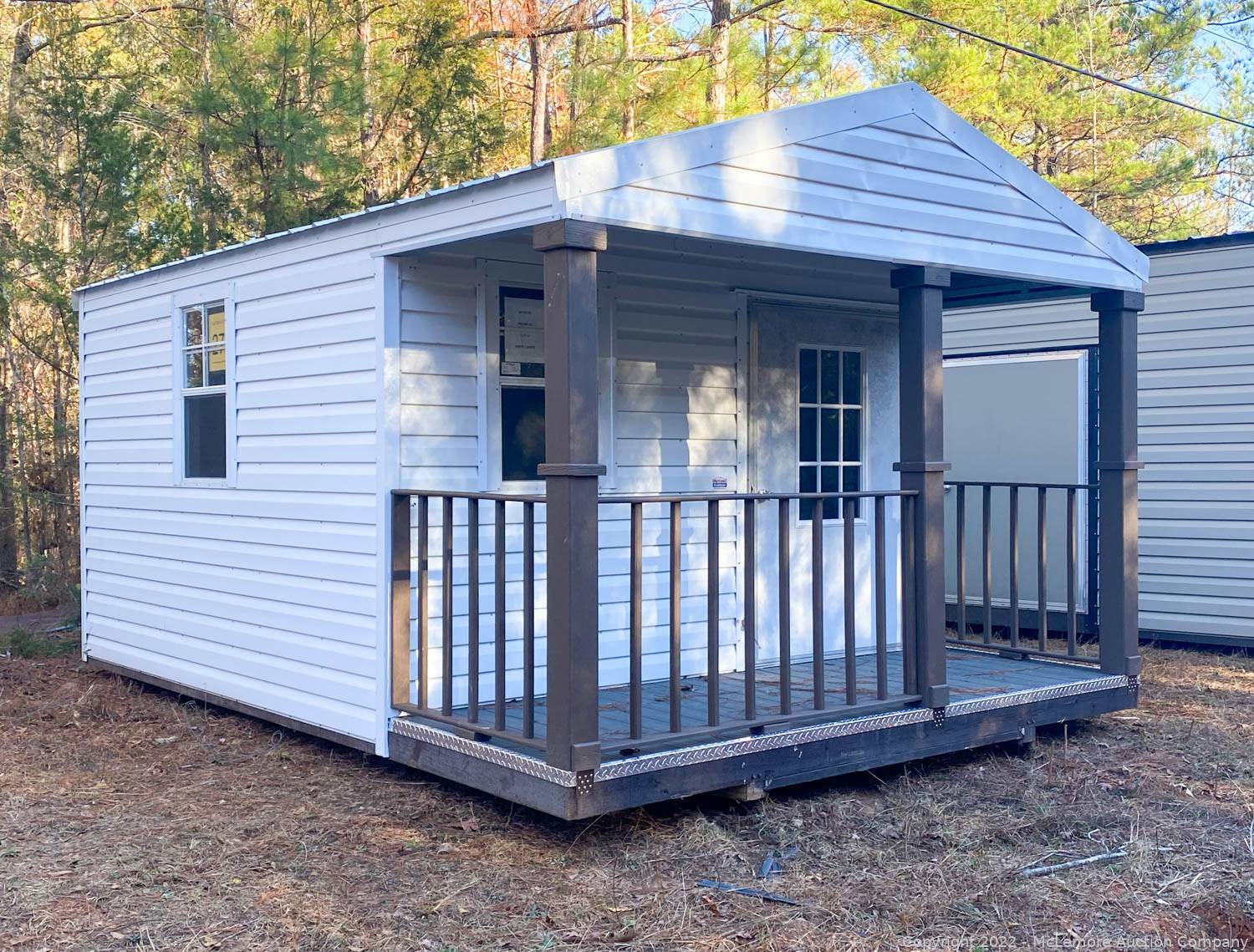 McLemore Auction Company Auction 30 Portable Storage Sheds in