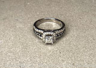 14 Karat White Gold Engagement Ring Princess Cut Diamond Brilliant Cut Black Diamonds and Brilliant Cut White Diamonds