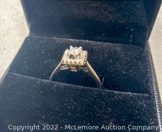 14 Karat White Gold Engagement Ring .2 Carat Princess Cut Diamond and 18 Brilliant Cut Diamonds