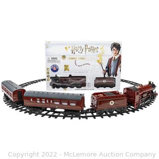 New in box - Harry Potter Hogwarts Express Train Set -  Ready to Play Train Set with Remote - Authentic train sounds, including bell and whistle - Working headlight - SEE LINK (New - Open Box)