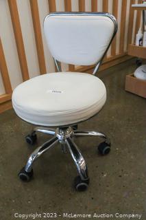 Low White Hydrolic Work Chair with Rollers and Adjustable Height Seat