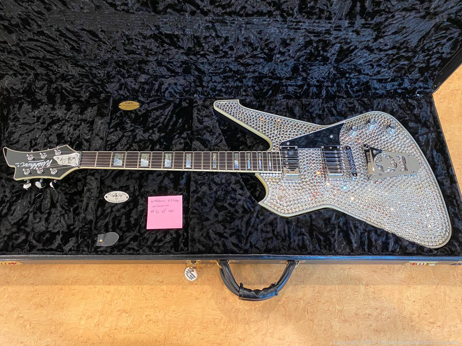 McLemore Auction Company Auction Electric Guitars, Betty Page Prints