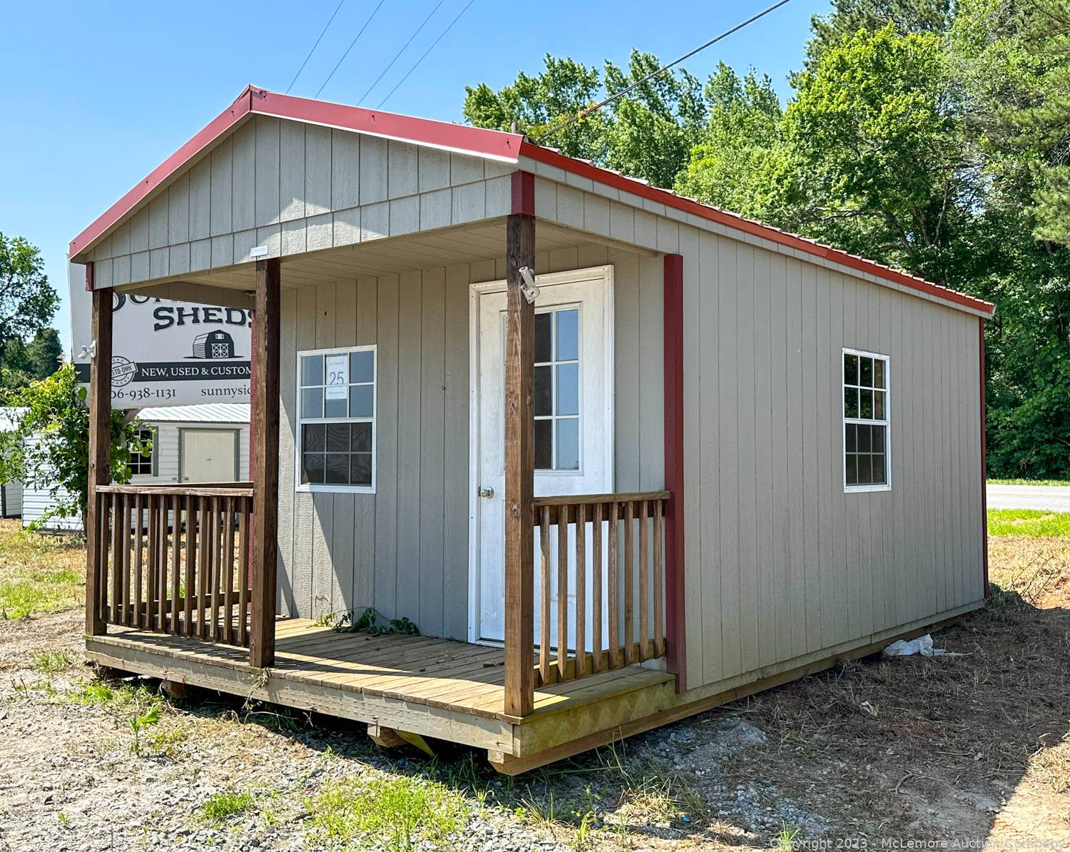 McLemore Auction Company Auction 33 Portable Storage Sheds and 4