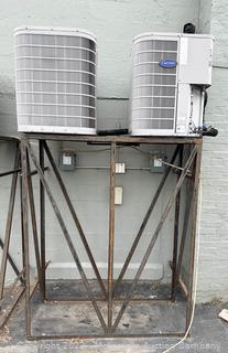 Pair of Carrier Central Air Conditioner Units with Steel Stand