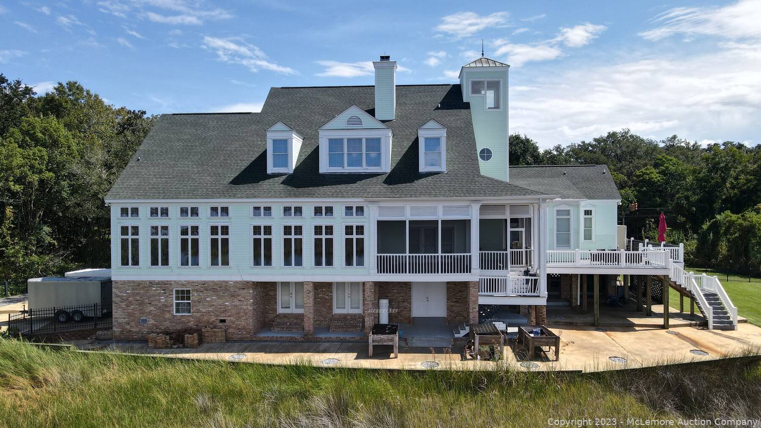 McLemore Auction Company Auction Premier Waterfront Home on 1.3±