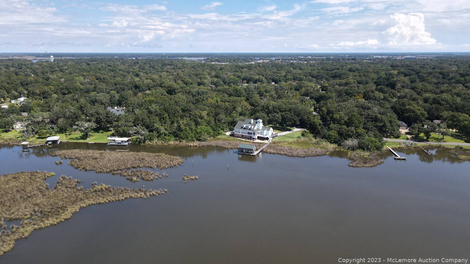 McLemore Auction Company Auction Premier Waterfront Home on 1.3±