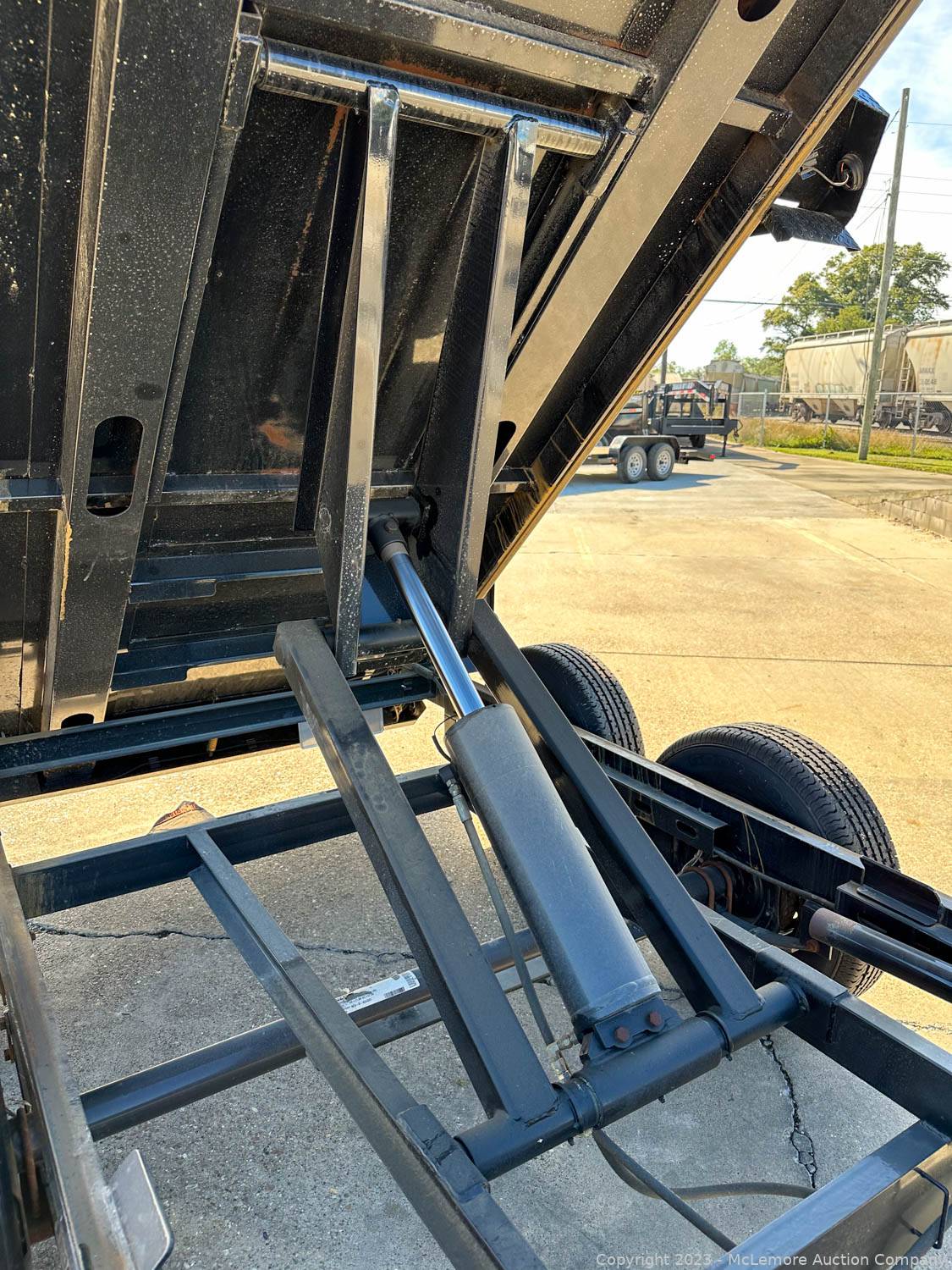 McLemore Auction Company Auction 59 Late Model Utility, Dump