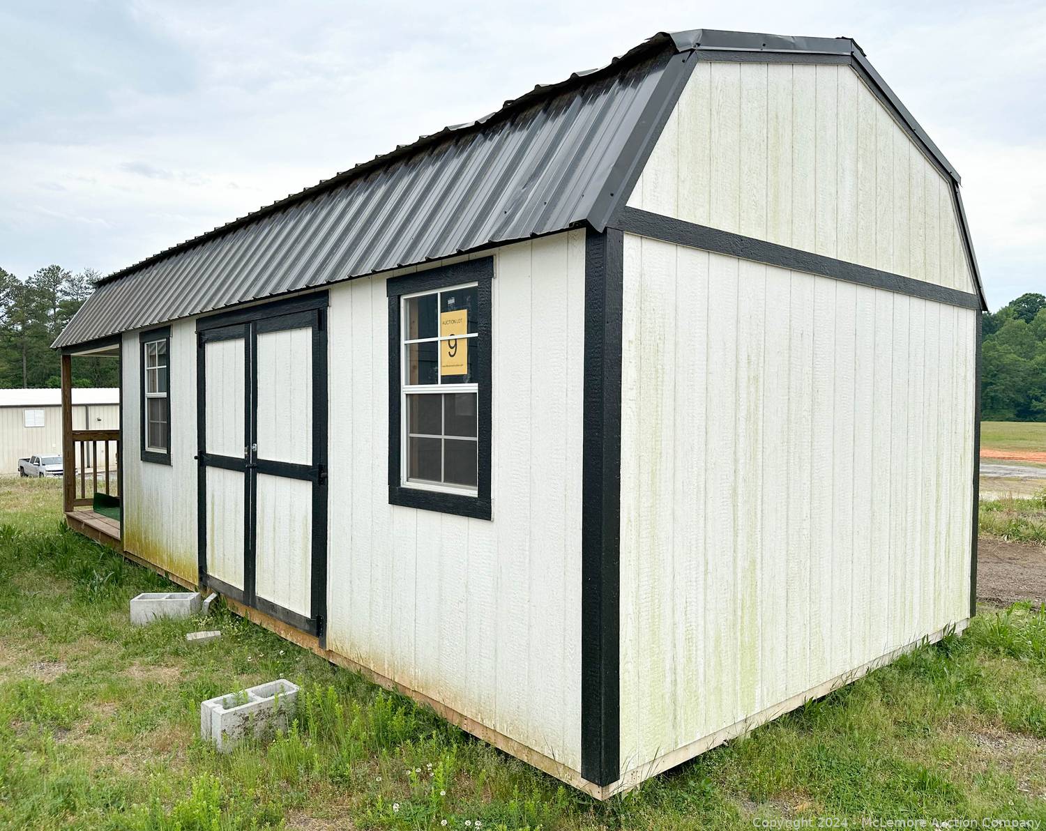 mclemore-auction-company-auction-9-portable-storage-sheds-in
