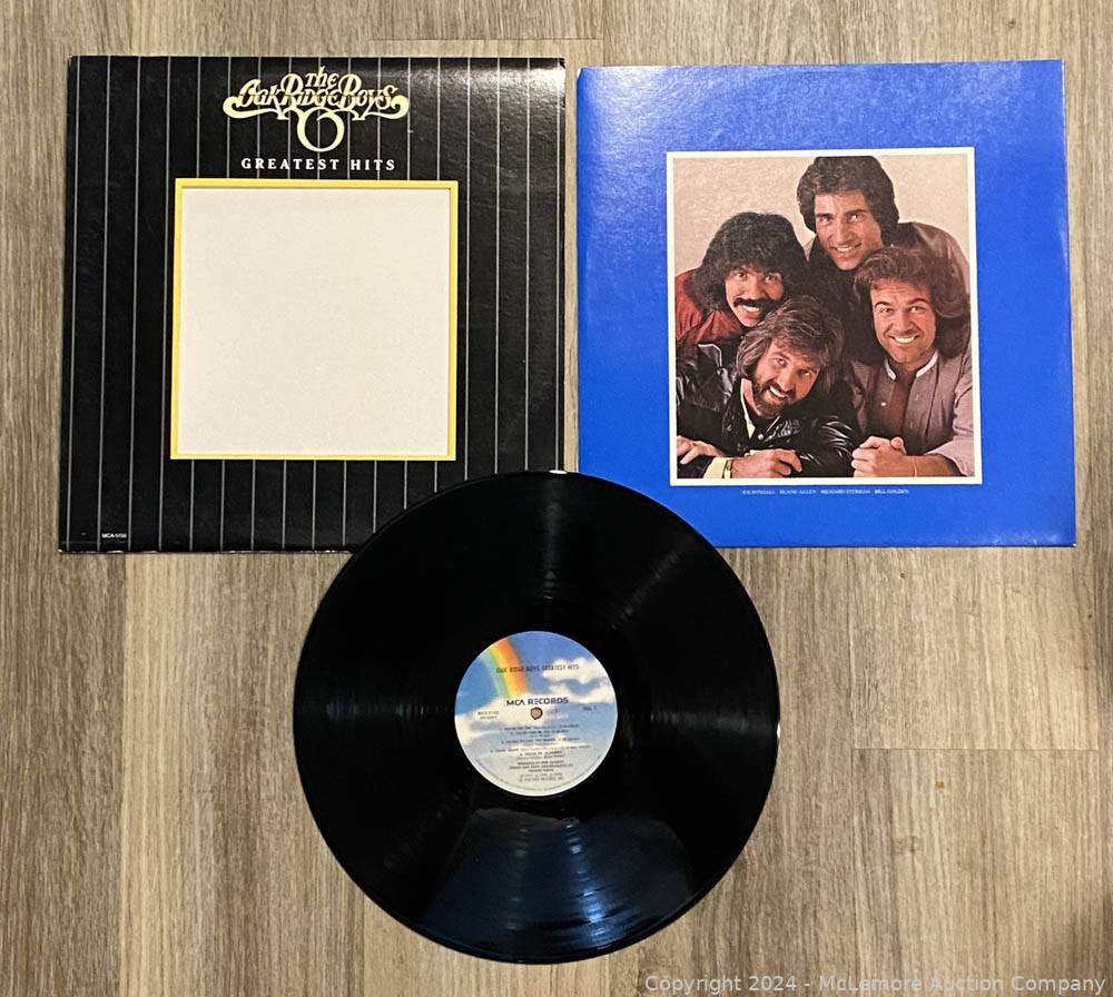 McLemore Auction Company Auction Gemstones, Rare Coins, Vinyl