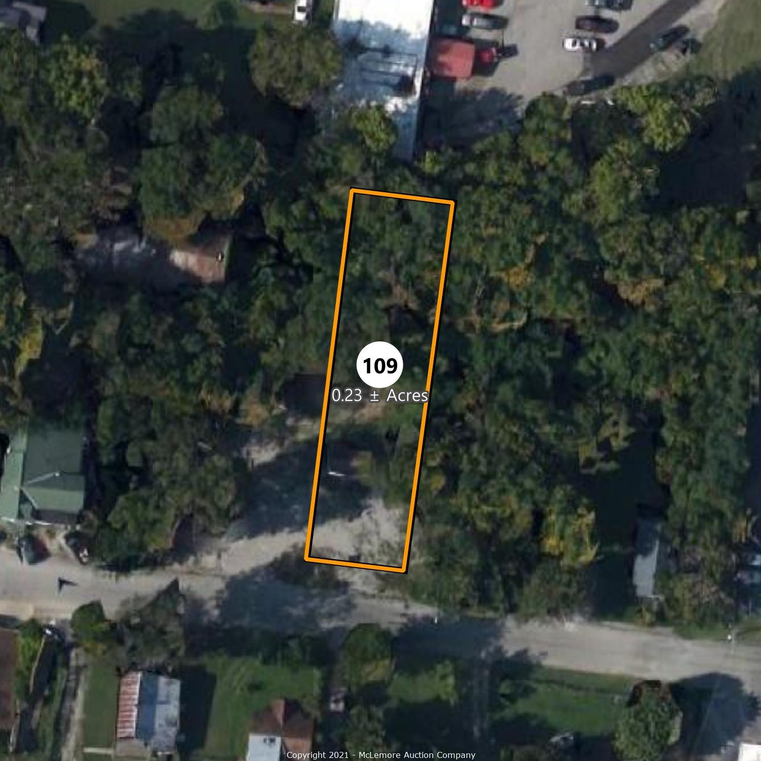 McLemore Auction Company Auction Three Building Lots and a Building