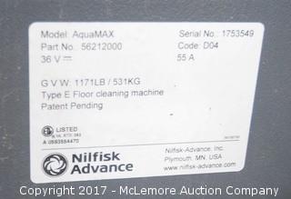 McLemore Auction Company - Auction: Tennant Floor Sweepers and Advance