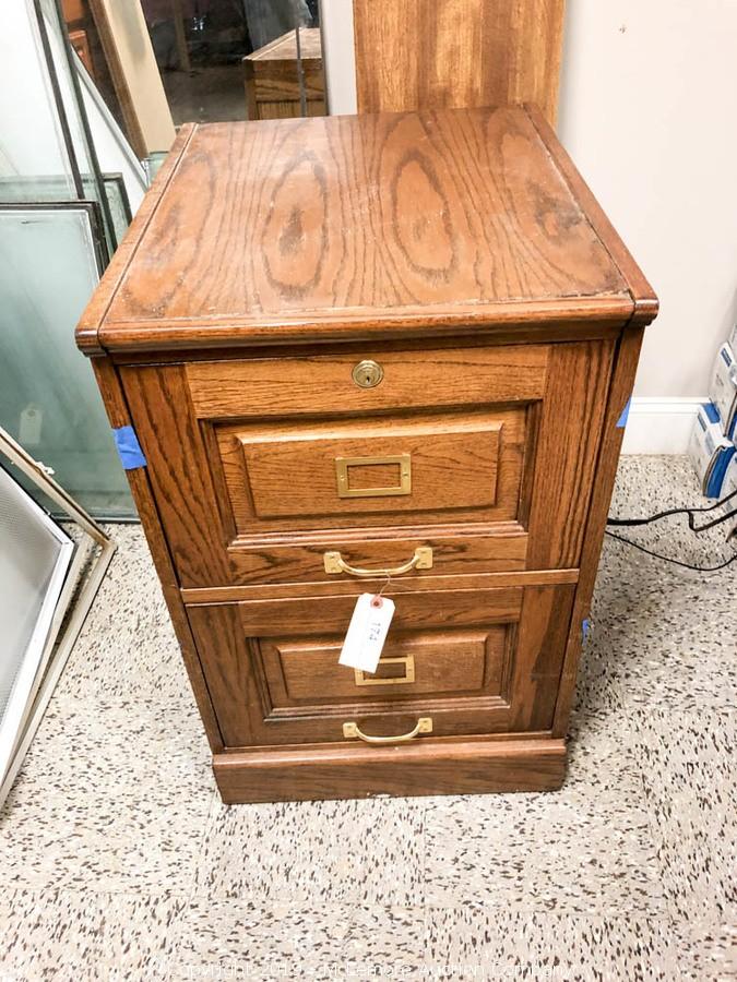 Mclemore Auction Company Auction Outdoor Woodworks Moving Sale Of Surplus Tools And Materials With Surplus And Overstock Appliances Vents Lighting Tubs Sinks And Water Heaters Item 2 Drawer File Cabinet