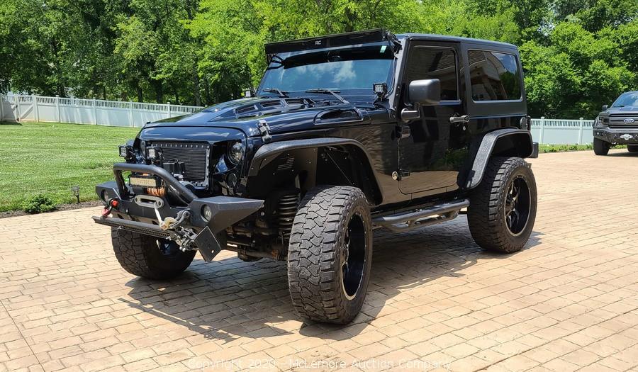McLemore Auction Company - Auction: 2013 Jeep Wrangler Custom with More  Than $20,000 in Add-ons and Accessories ITEM: 2013 Jeep Wrangler Sport with  more than $20, in Add-ons and Accessories VIN#1C4AJWAG7DL654515