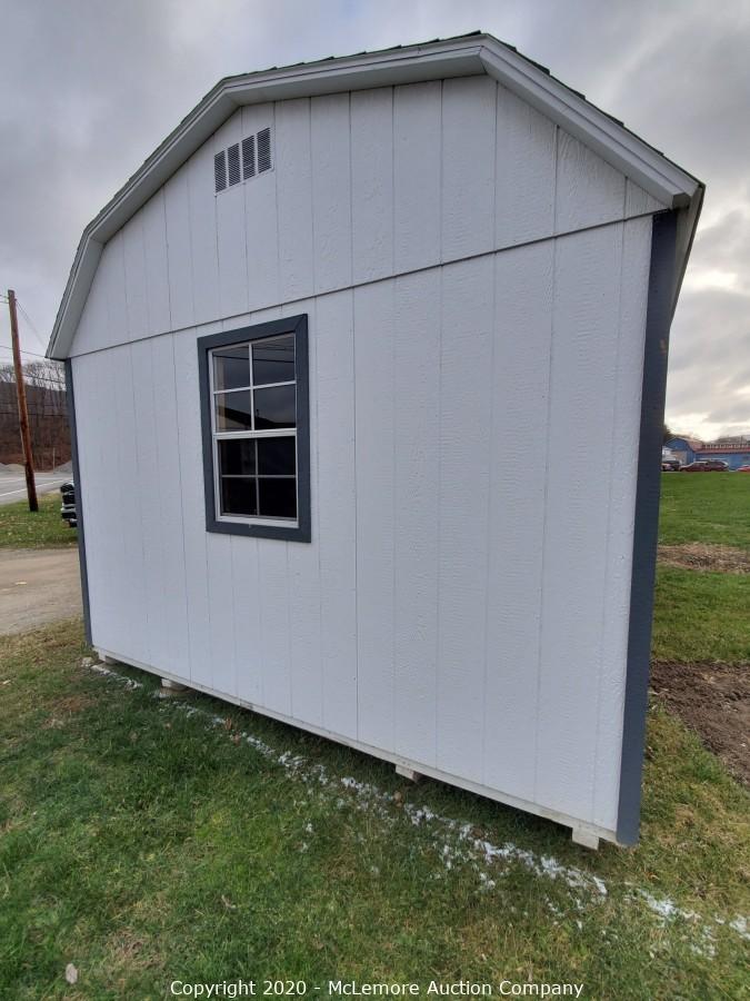 McLemore Auction Company Auction 12' x 24' Woodtex Shed Located in