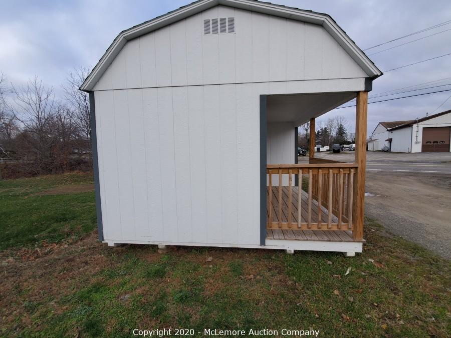 McLemore Auction Company Auction 12' x 24' Woodtex Shed Located in