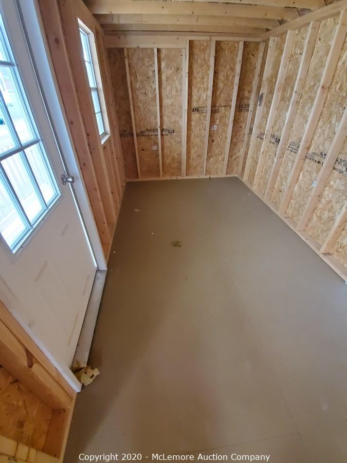 McLemore Auction Company Auction 12' x 24' Woodtex Shed Located in